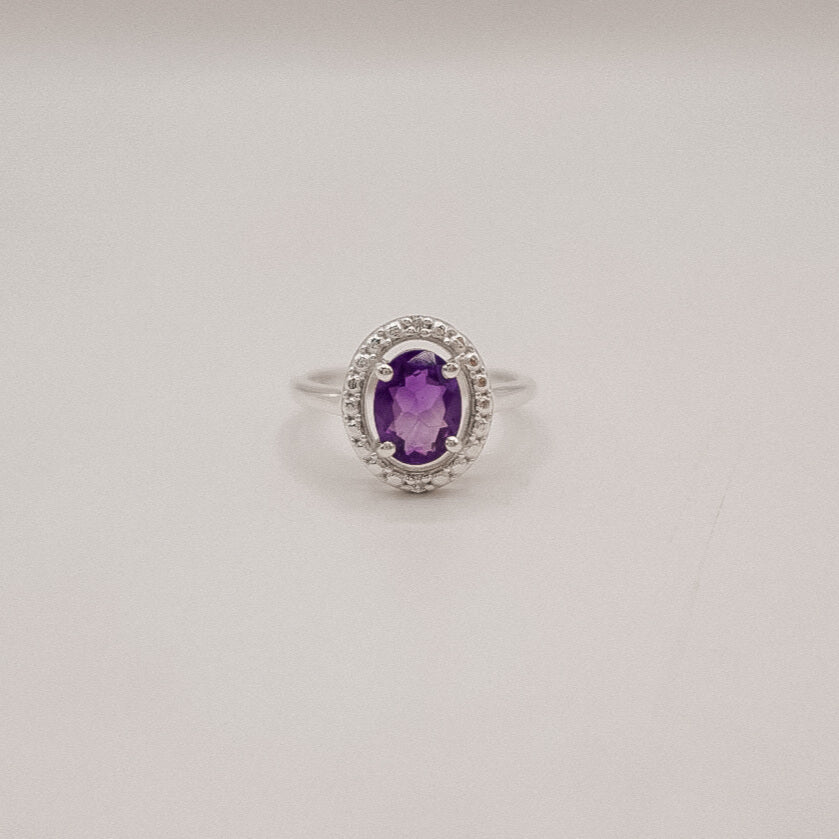 Moonlit Majesty – Oval Amethyst Halo Ring